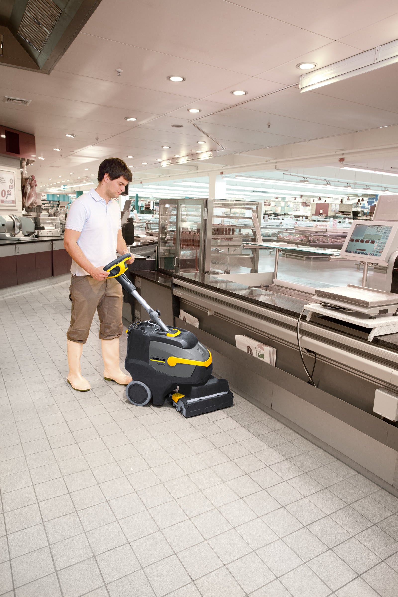 Karcher BR 35/12 C Bp Pack UL Scrubber Drier - 14"  in use on floor