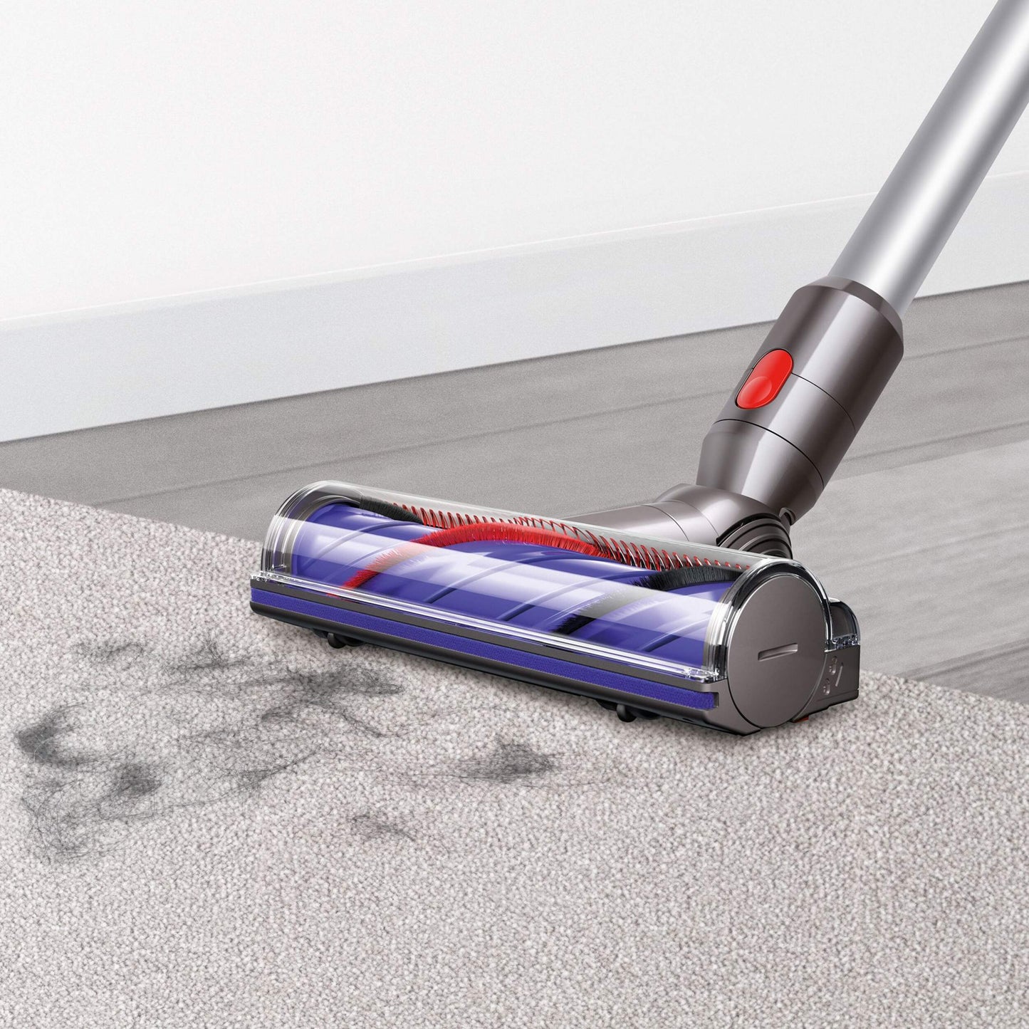 Dyson V7 Advanced vacuuming dirt and hair off carpet