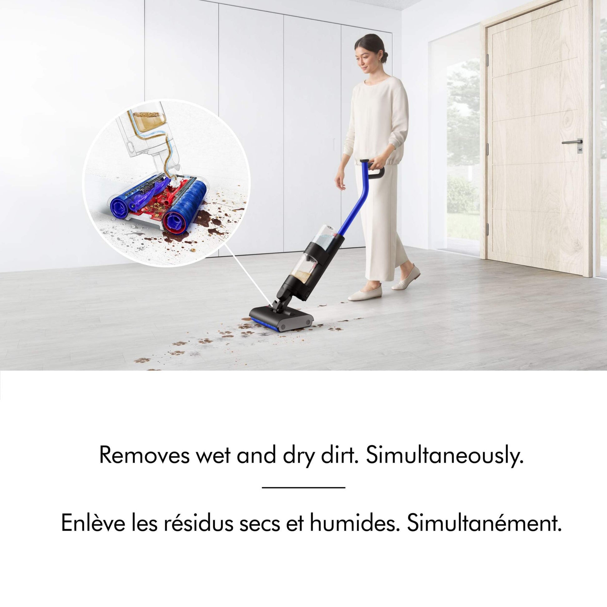 Girl in white clothes vacuuming floor with Dyson washG1. A diagram is displaying the way the dirt and liquid is filtered through the vacuum. English and French text overlay explaining how vacuum removes wet and dry dirt at the same time.