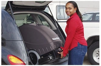 Powr-Flite PFX900S Prowler Self-Contained Carpet Extractor loading in car