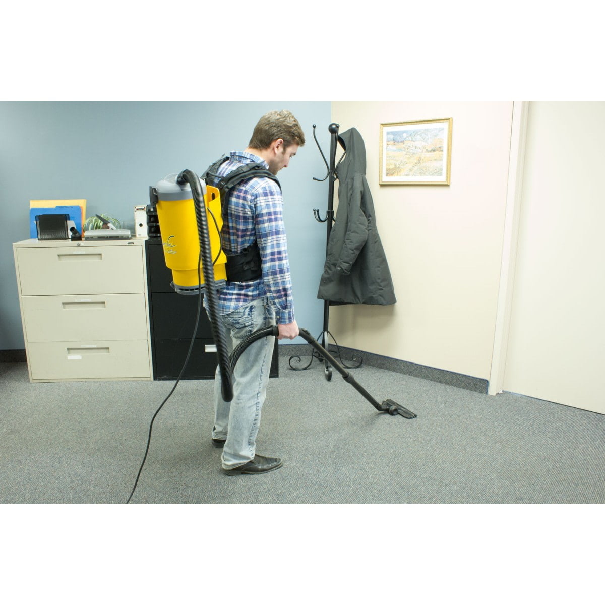 Johnny Vac T1 vacuuming floor