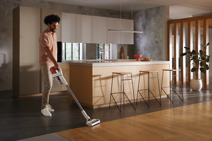 Miele Duoflex HX1 Cordless Stick Vacuum - Terra Red vacuuming